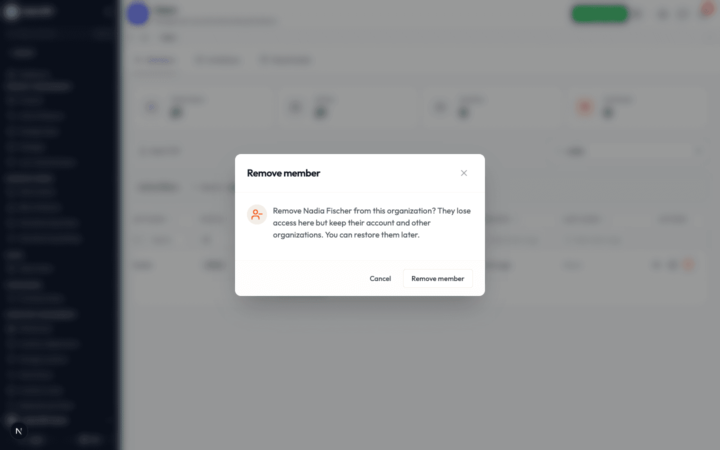 The Remove member confirmation explaining the person loses access here but keeps their account