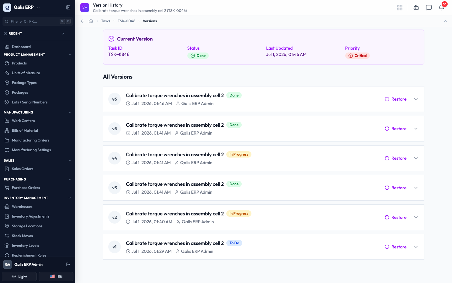 The Version History page listing every version of a task with a Restore button on each